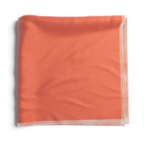 Burton lens cloth, folded